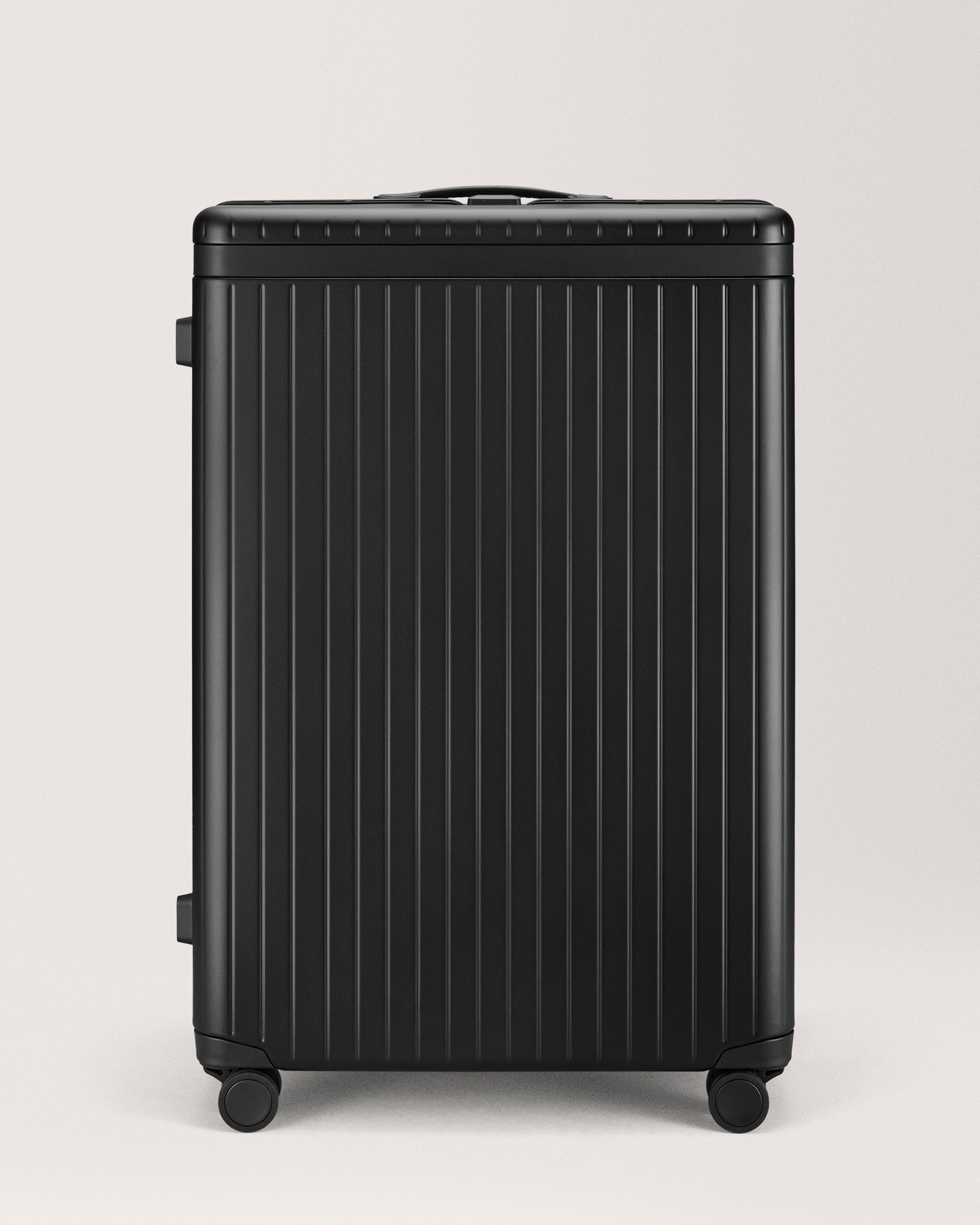 The Large Check-in - Return Extra-large hard-shell suitcase