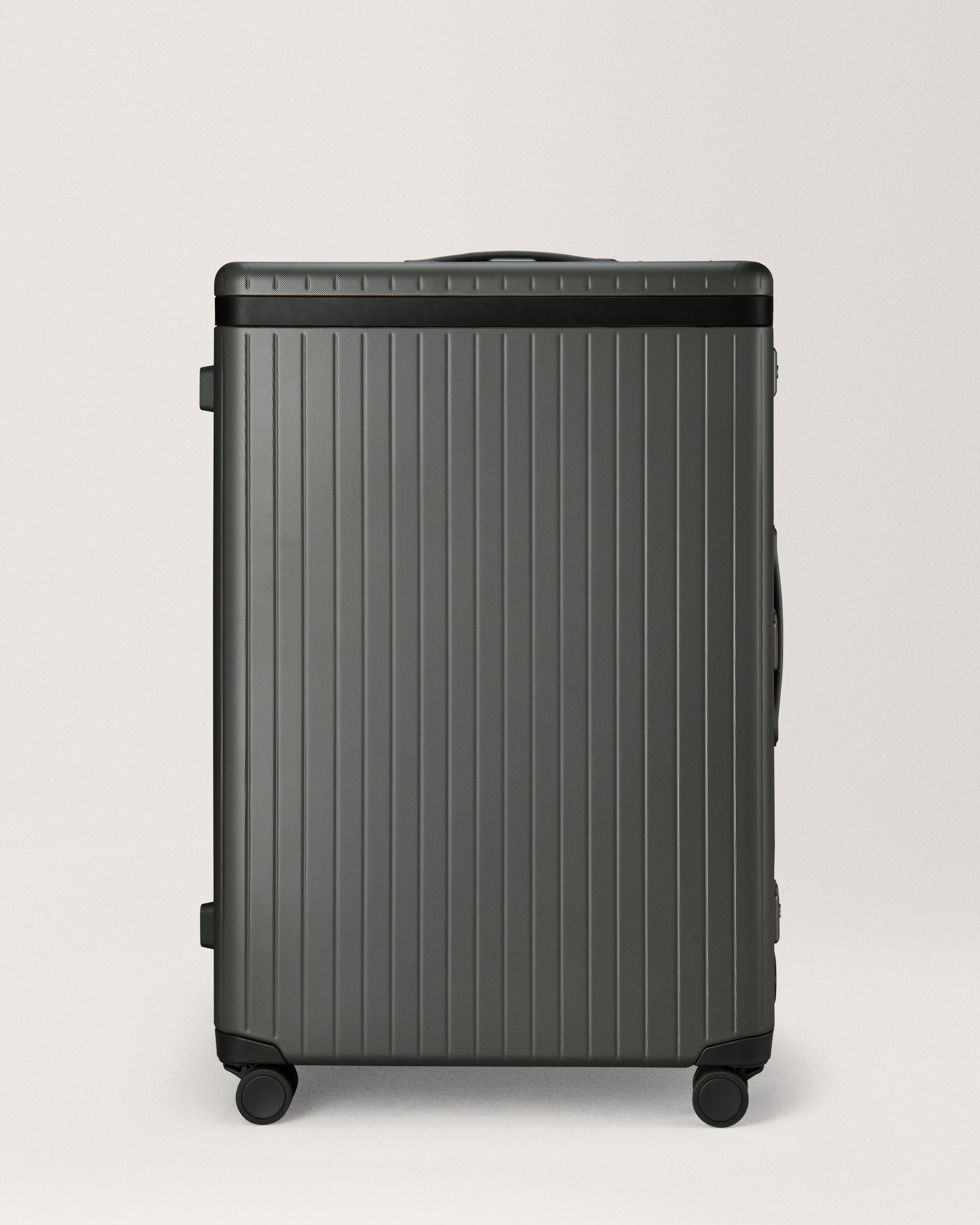 The Large Check-in - Return Grey / Black / Dotted Extra-large hard-shell suitcase